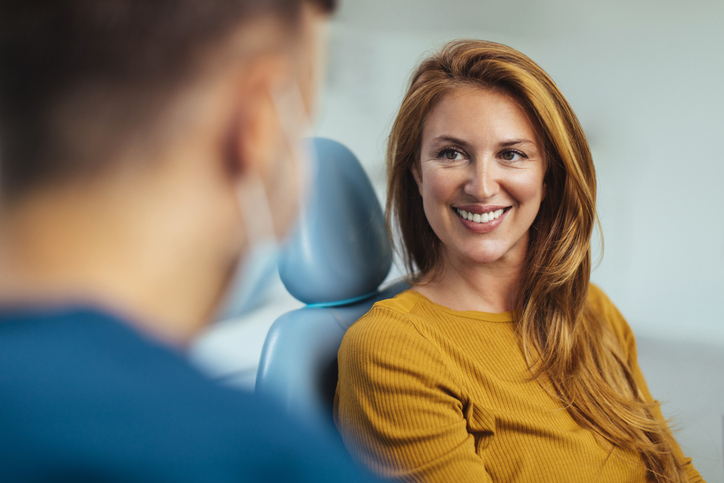 Dentist consulting with a patient